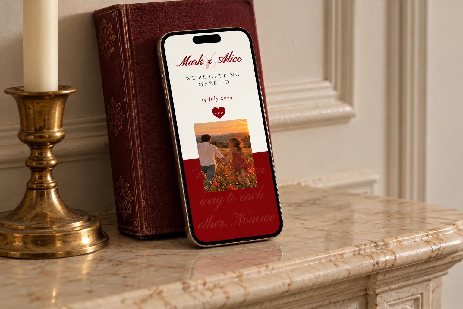 Crimson Vows names and date screen on a tilted phone leaning against a burgundy book on a marble mantel